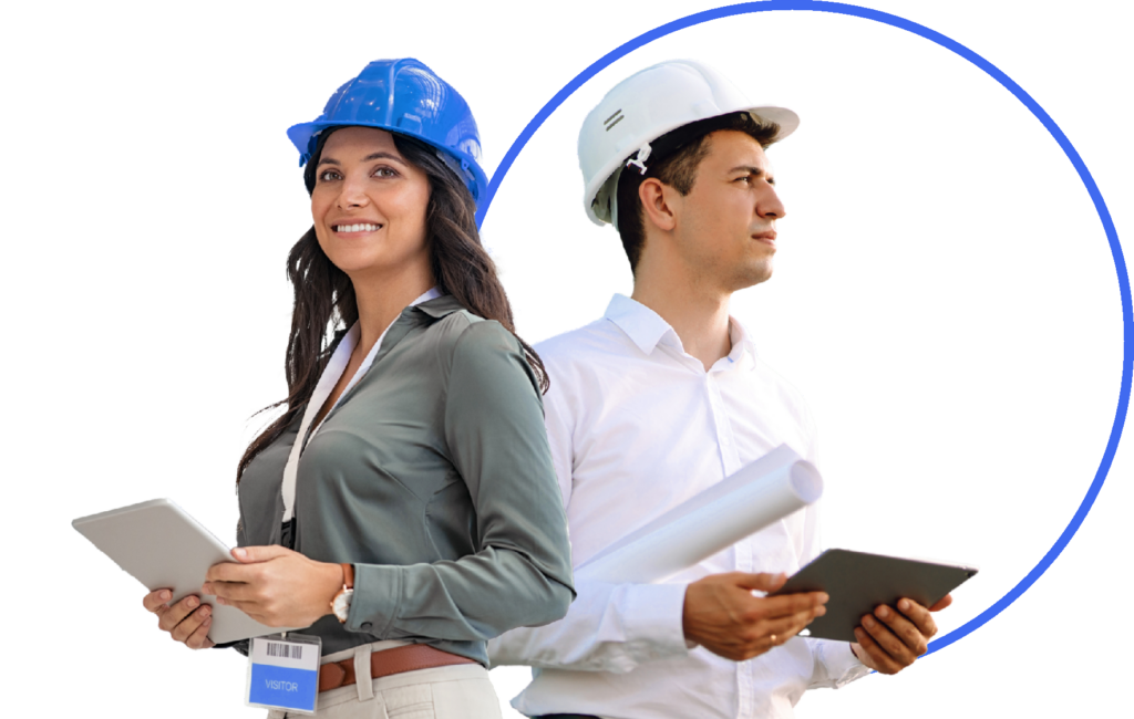 A woman and a man, both in hard hats and holding tablets.