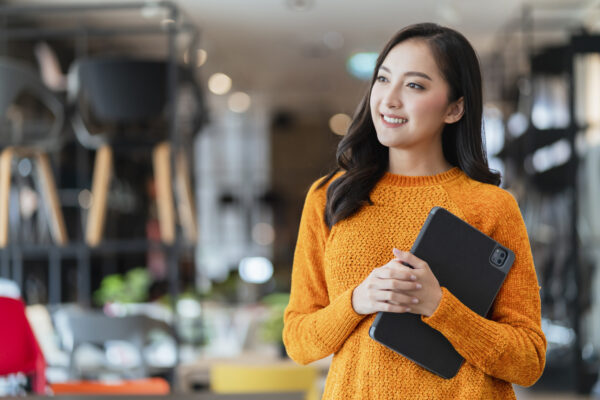 woman in sweater looking away